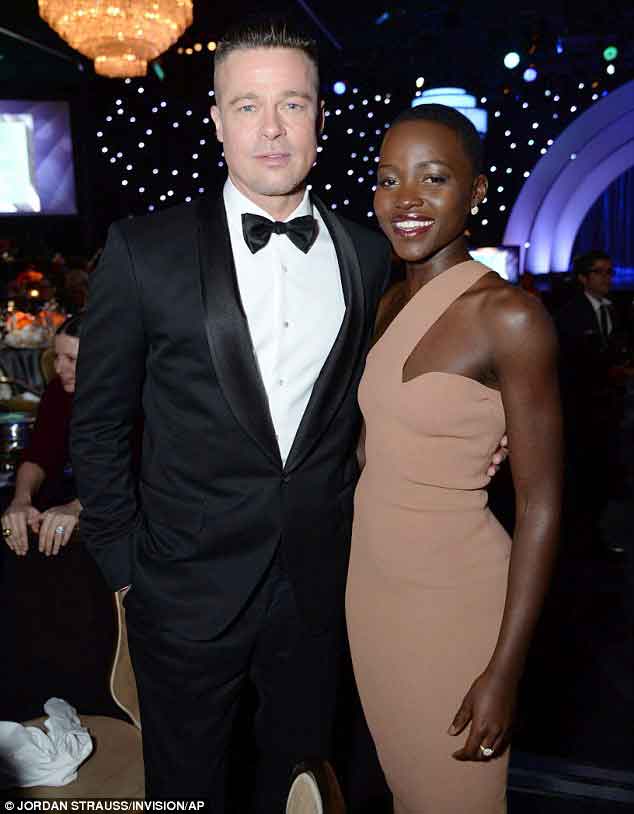 Lupita Nyong'o and Brad Pitt