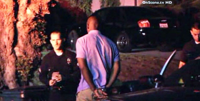 Michael Jace handcuffed
