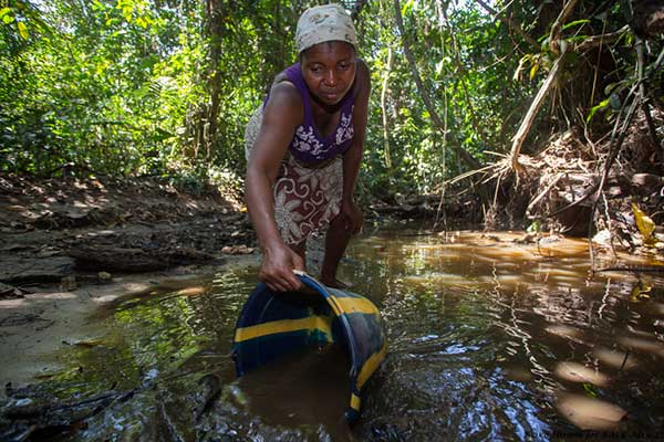 Woman Getting Water