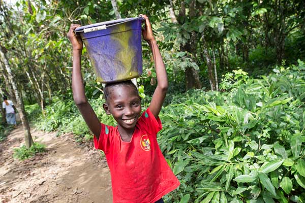 Girl Carrying Water
