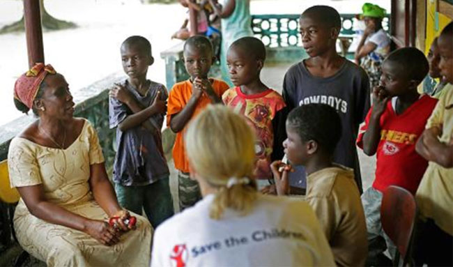 Carolyn Miles with Orphans