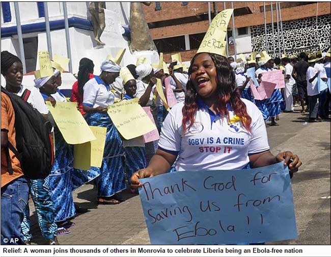 Awoman joins thousands to celebrate