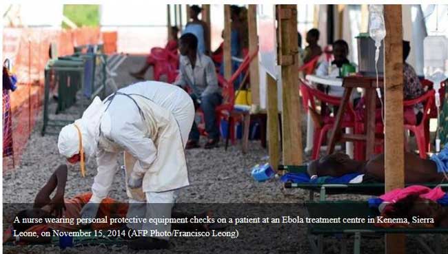 Nurse wearing personal protective gear